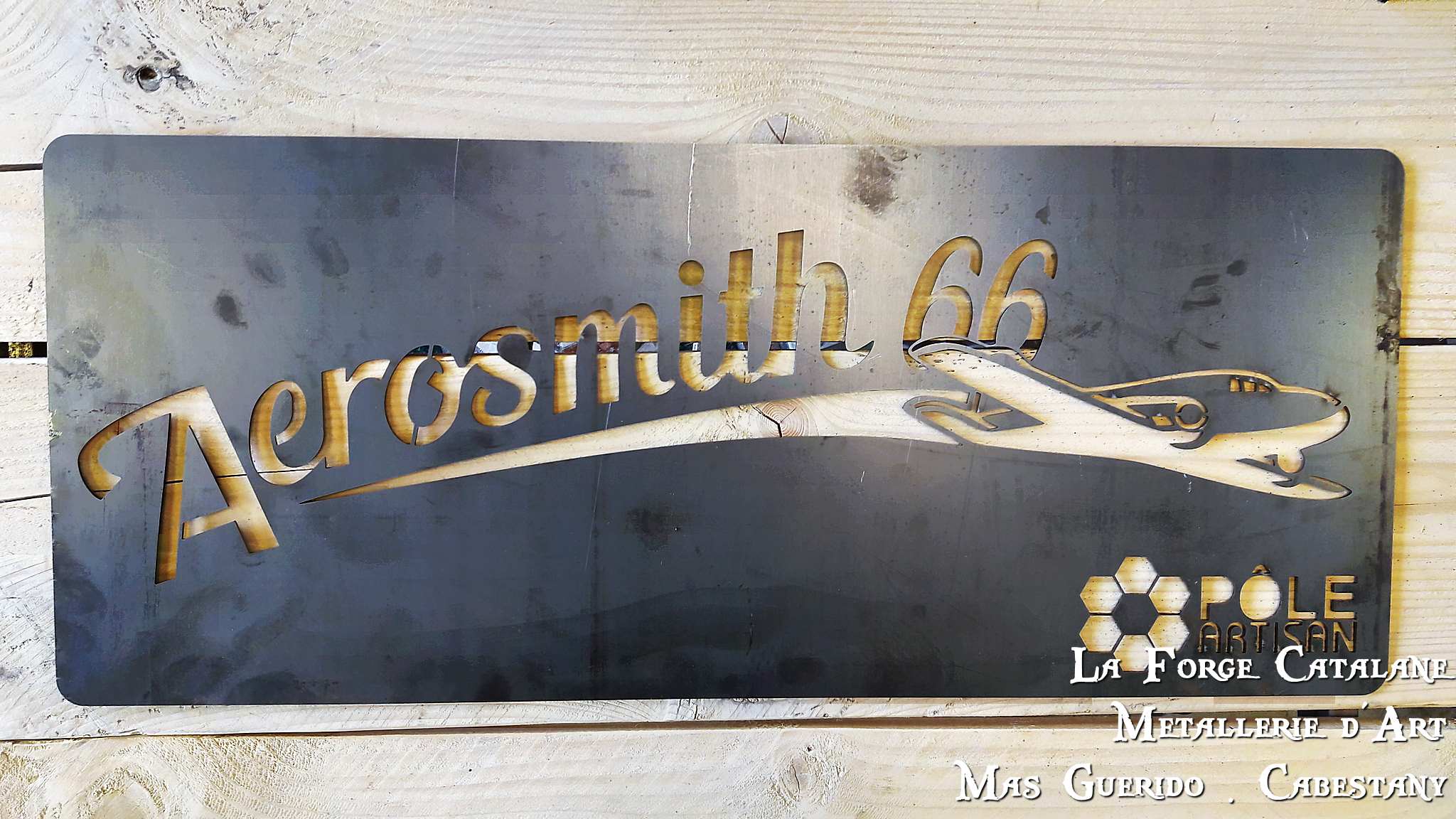 enseigne aerogare en decoupe laser  forge catalane.jpg